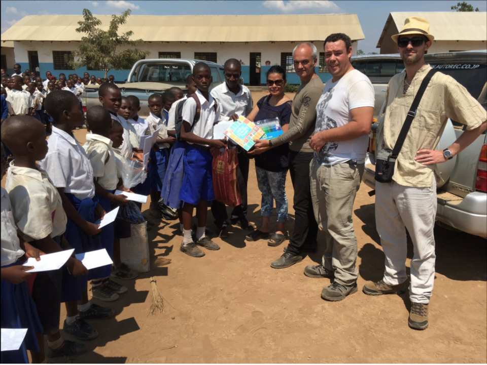 The visiting chefs and Victor Griffiths with the children
